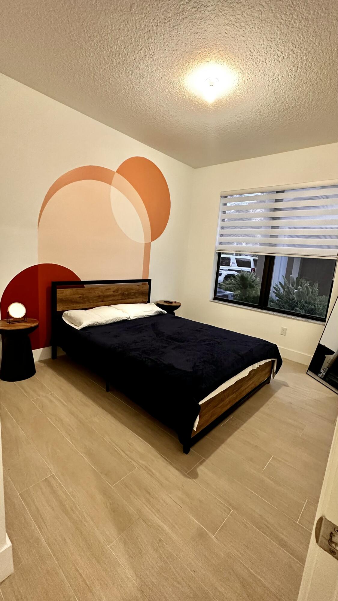 5570 Quiet Lake Place Westlake, FL 33470 - Photo 10 of 18 a bedroom with a bed and window