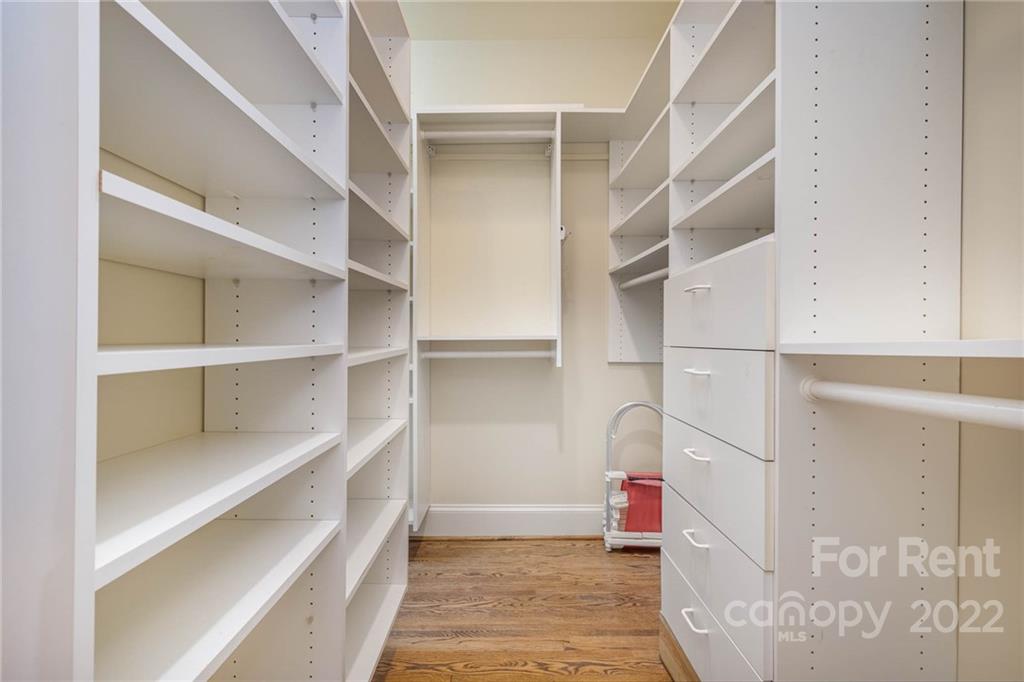1107 Queens Road Charlotte, NC 28207 - Photo 25 of 44 a room with shelves