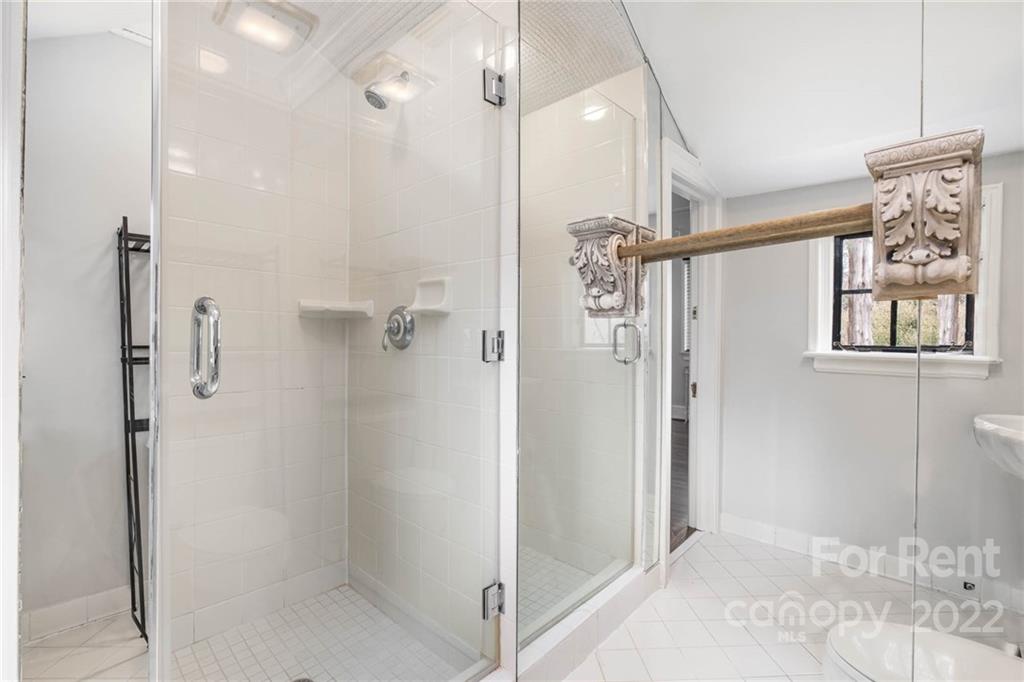 1107 Queens Road Charlotte, NC 28207 - Photo 36 of 44 a bathroom with a shower