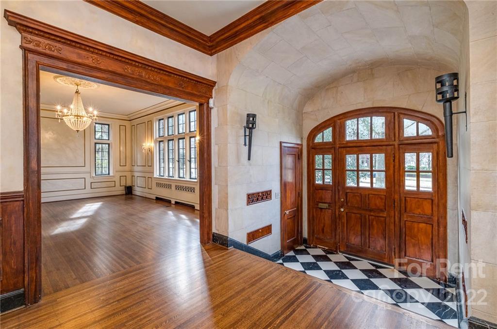 1107 Queens Road Charlotte, NC 28207 - Photo 5 of 44 a view of an entryway with wooden floor