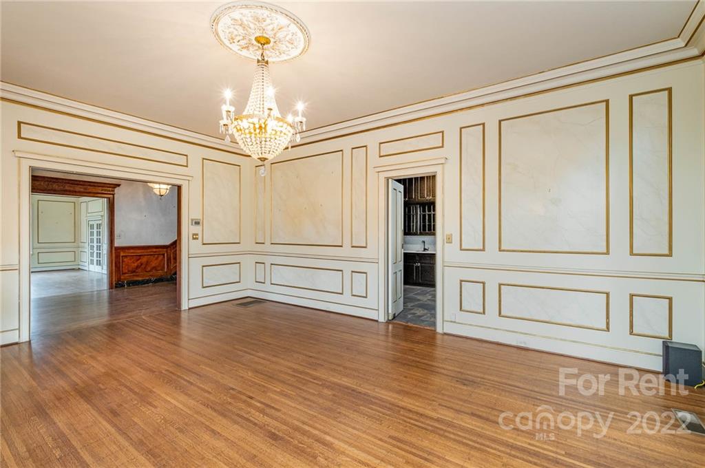 1107 Queens Road Charlotte, NC 28207 - Photo 8 of 44 a view of a livingroom with wooden floor