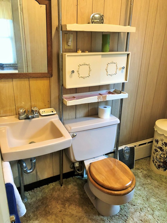 2022-2024 Palmer Road Three Rivers, MA 01080 - Photo 15 of 30 a bathroom with a sink and a mirror