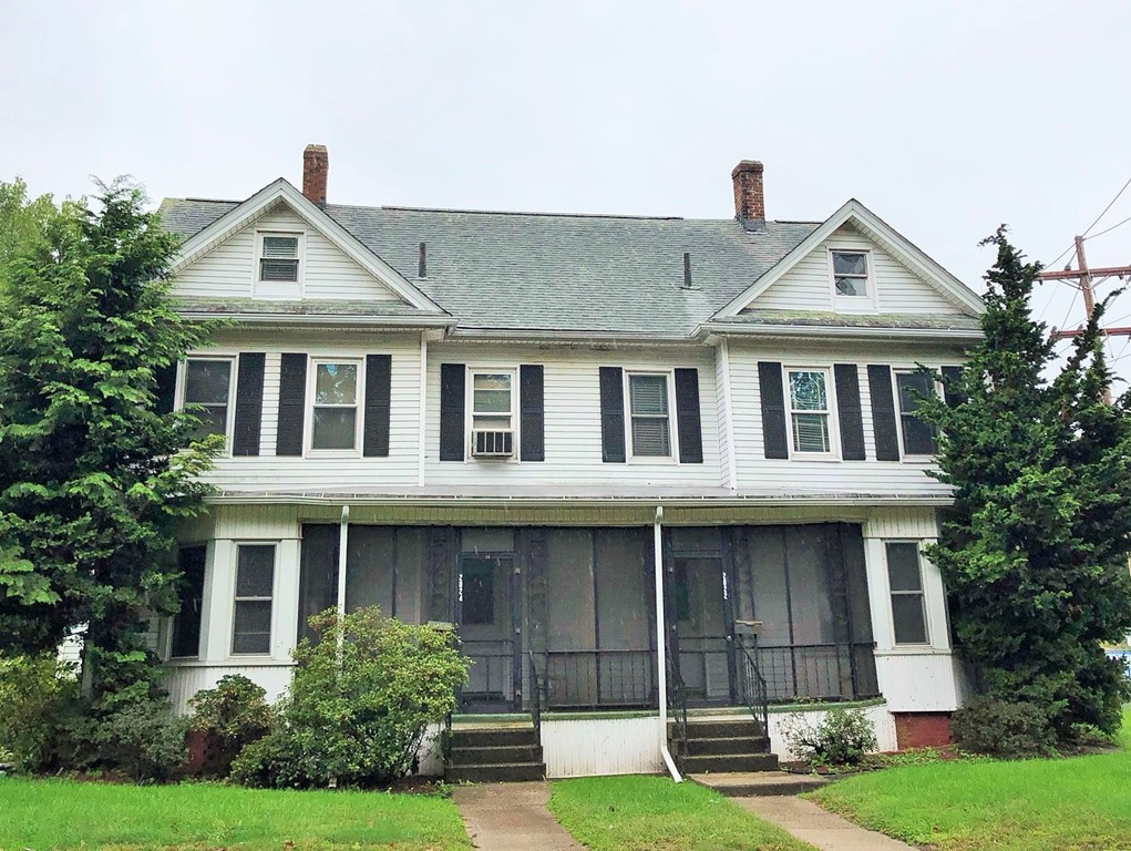 2022-2024 Palmer Road Three Rivers, MA 01080 - Photo 2 of 30 a front view of a house with garden