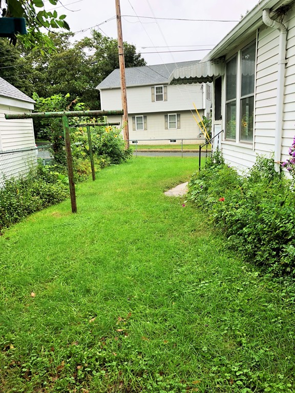 2022-2024 Palmer Road Three Rivers, MA 01080 - Photo 29 of 30 front view of a house with a yard