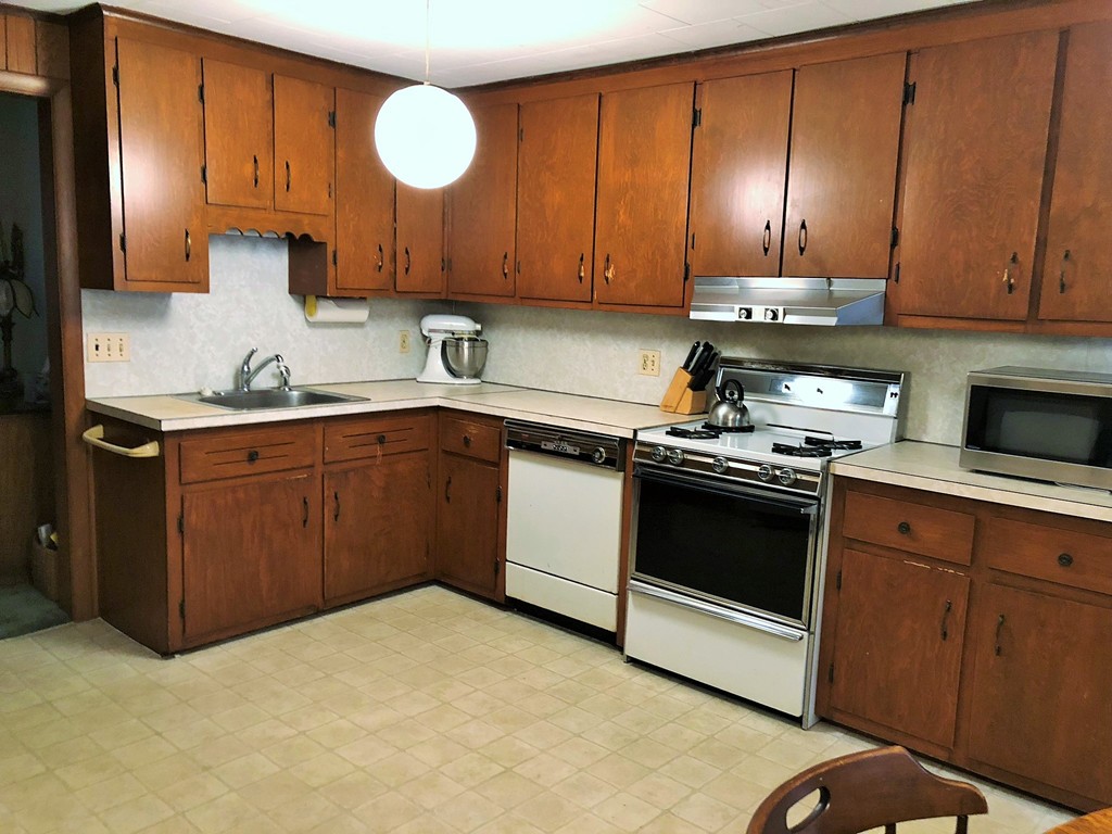 2022-2024 Palmer Road Three Rivers, MA 01080 - Photo 9 of 30 a kitchen with a sink cabinets and appliances