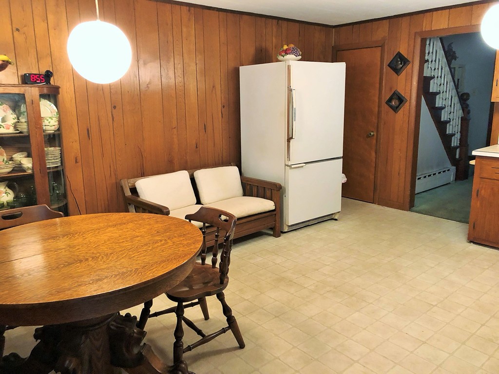 2022-2024 Palmer Road Three Rivers, MA 01080 - Photo 10 of 30 a dining room with furniture and a refrigerator