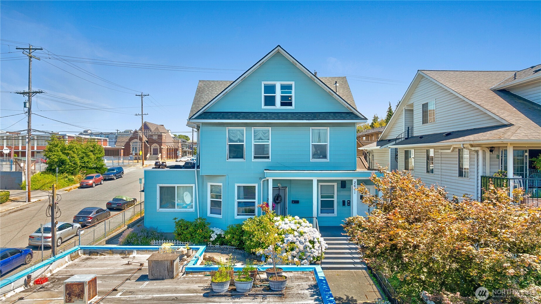 2601 Rucker Avenue Everett, WA 98201 - Photo 5 of 39 a front view of a house with garden