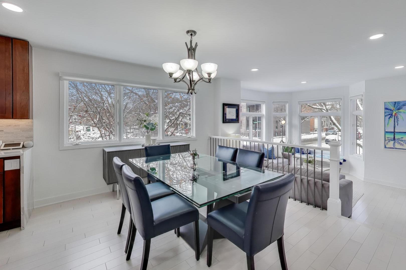 1459 West Wrightwood Avenue, Unit 1459 Chicago, IL 60614 - Photo 12 of 40 a view of a dining room with furniture window and wooden floor