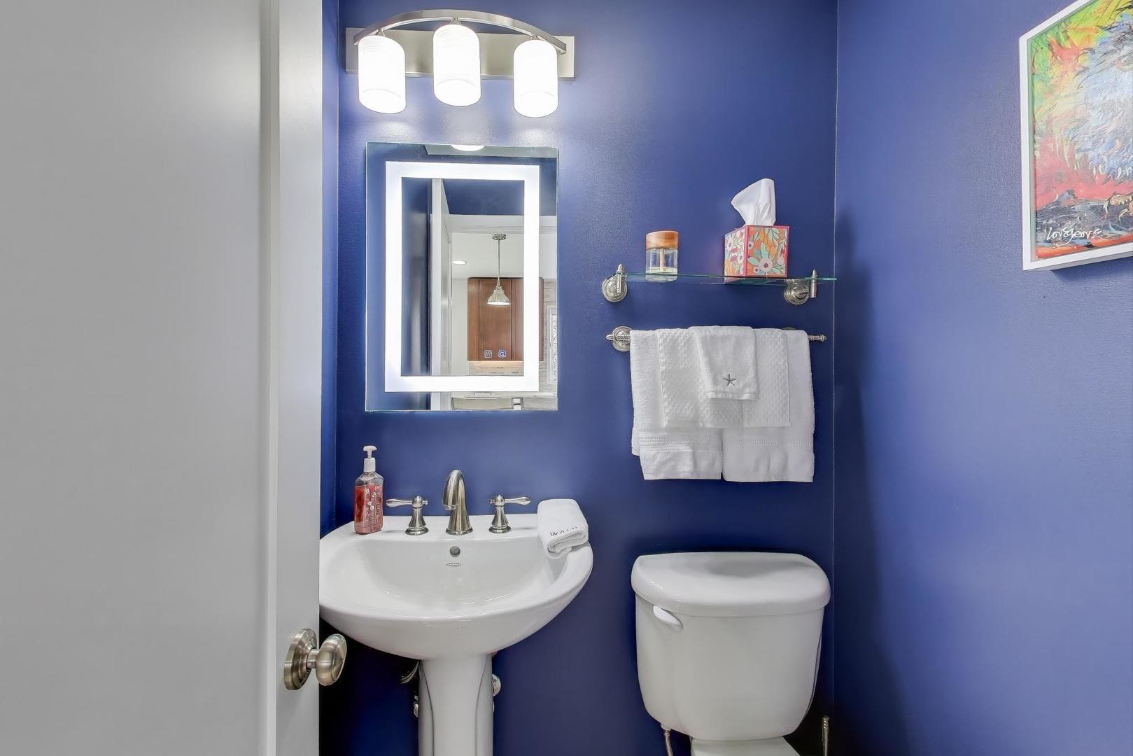 1459 West Wrightwood Avenue, Unit 1459 Chicago, IL 60614 - Photo 19 of 40 a bathroom with a toilet sink and mirror