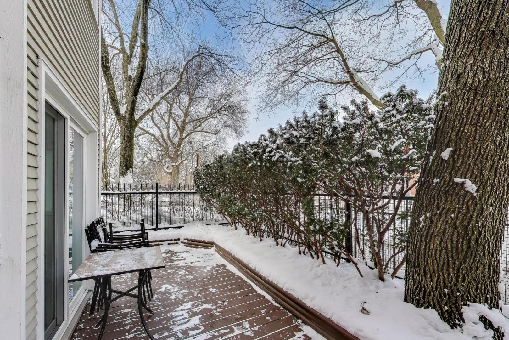 1459 West Wrightwood Avenue, Unit 1459 Chicago, IL 60614 - Photo 3 of 40 a view of a balcony with chairs