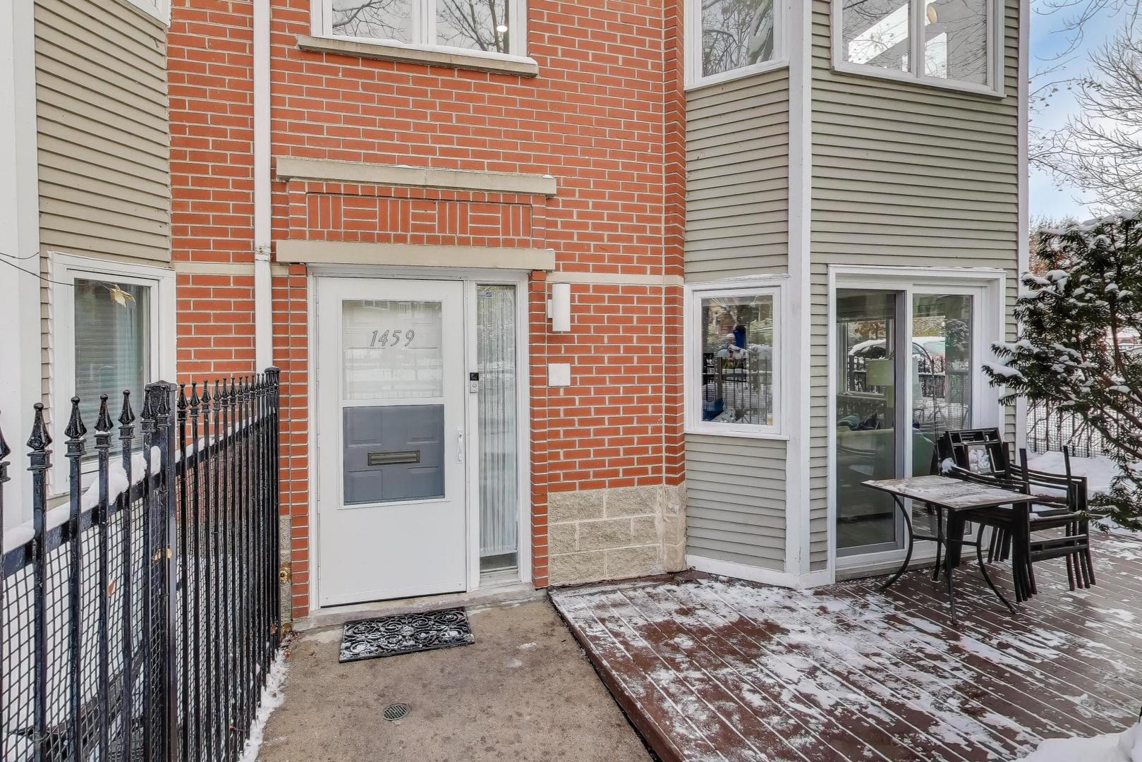 1459 West Wrightwood Avenue, Unit 1459 Chicago, IL 60614 - Photo 35 of 40 a view of a house with a bench and chair