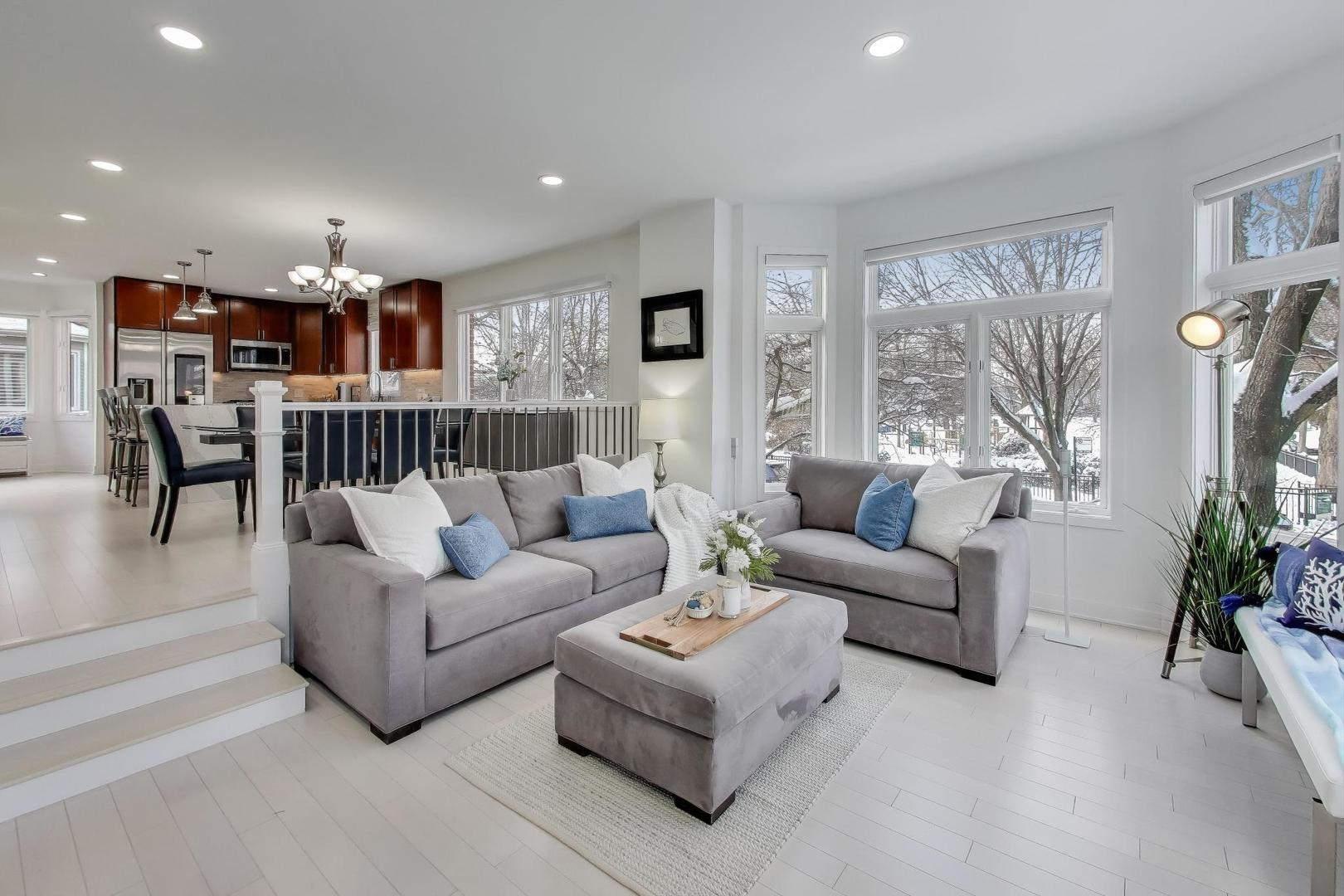 1459 West Wrightwood Avenue, Unit 1459 Chicago, IL 60614 - Photo 8 of 40 a living room with furniture and a flat screen tv