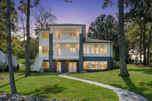 a view of entryway with stairs and wooden floor