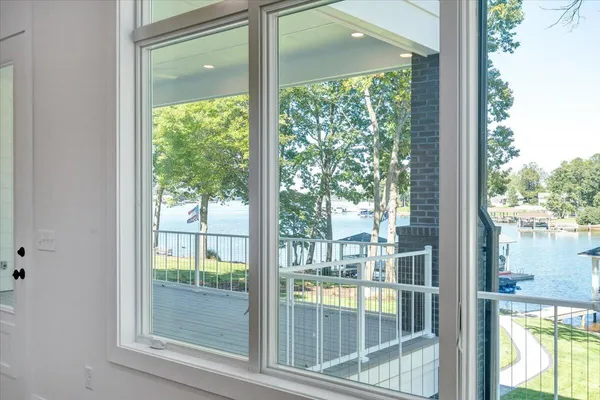 an aerial view of a house with garden space and street view
