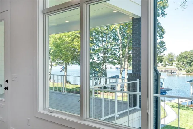 an aerial view of a house with garden space and street view