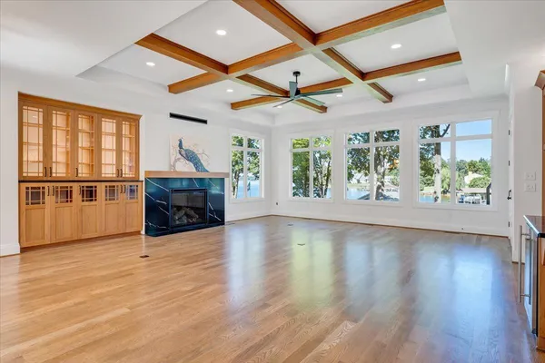 a kitchen with stainless steel appliances granite countertop a stove and cabinets