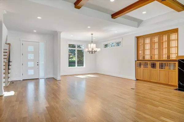 a view of outdoor space with wooden floor and city view