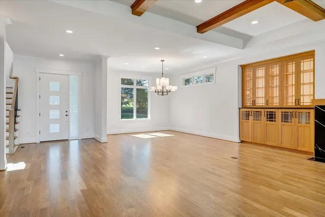 a view of outdoor space with wooden floor and city view