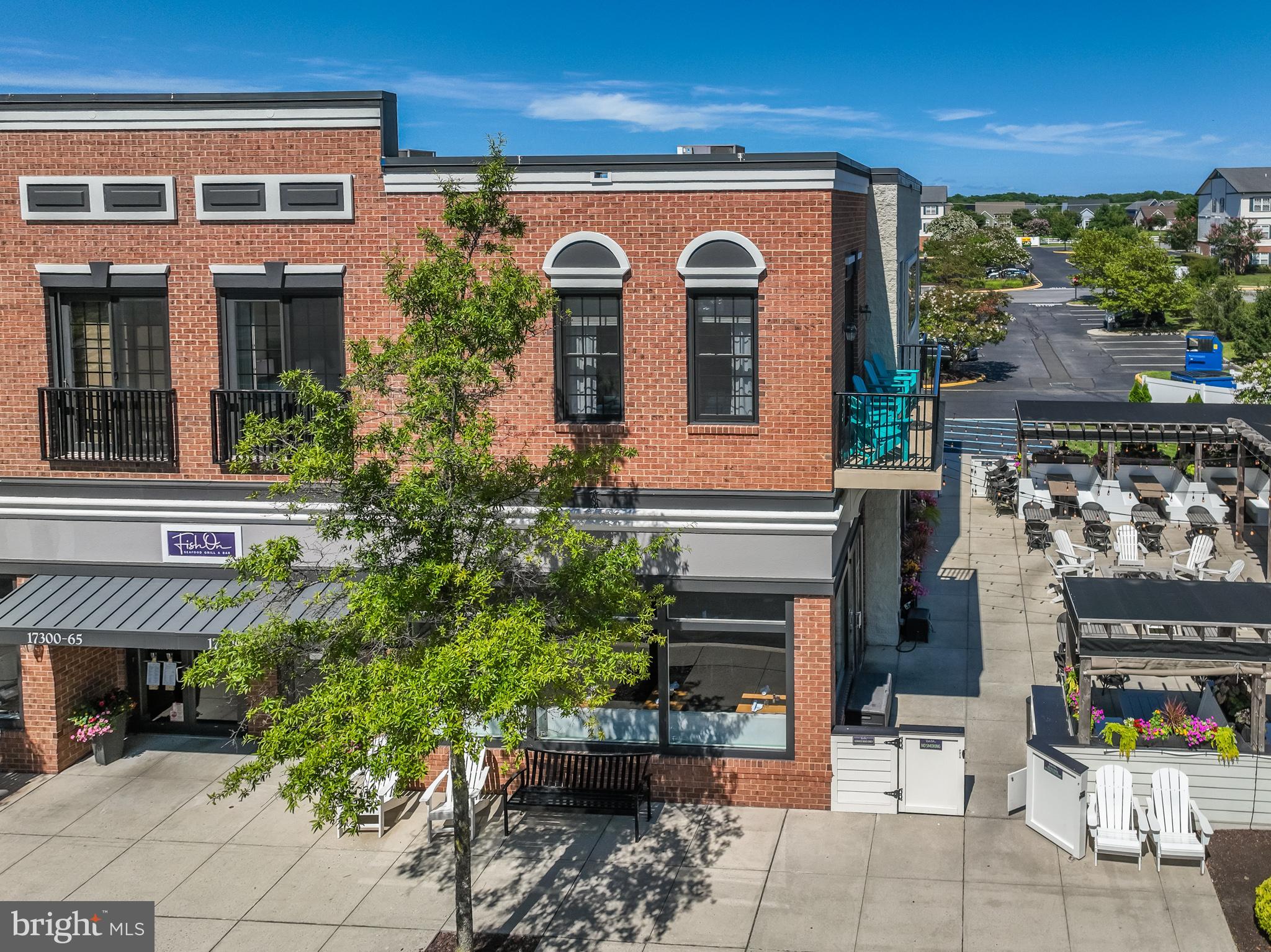 a front view of a house with outdoor space