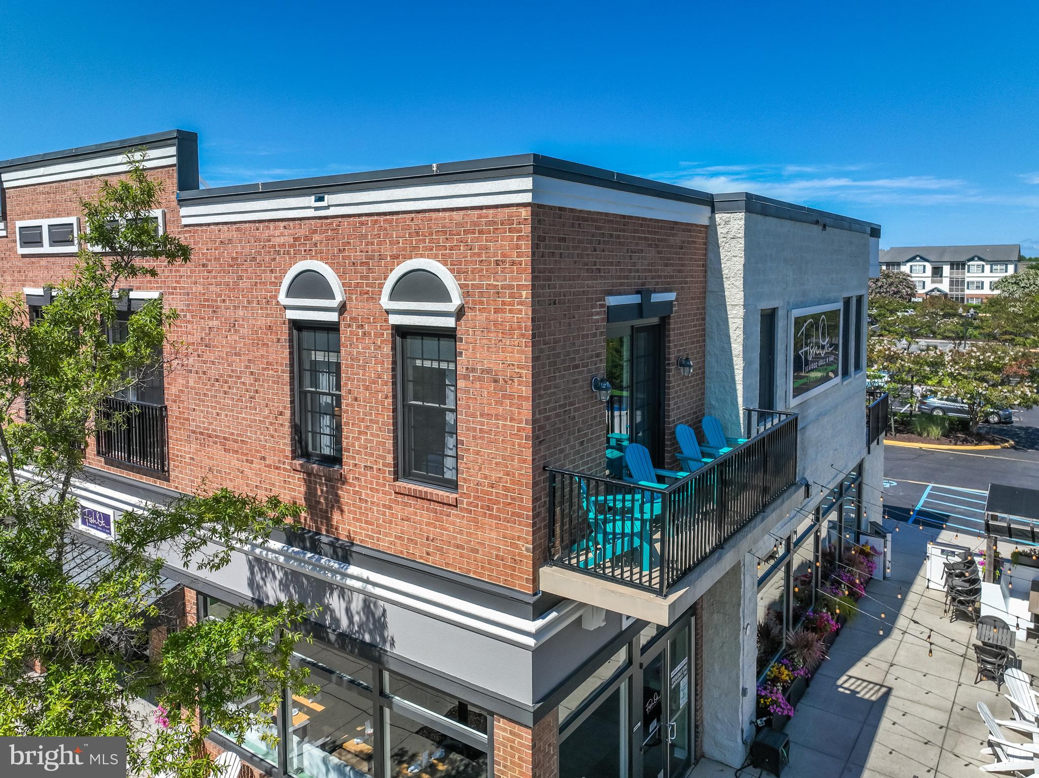 17300 North Village Main Boulevard, Unit 66 Lewes, DE 19958 - Photo 2 of 38 front view of house with a potted plant