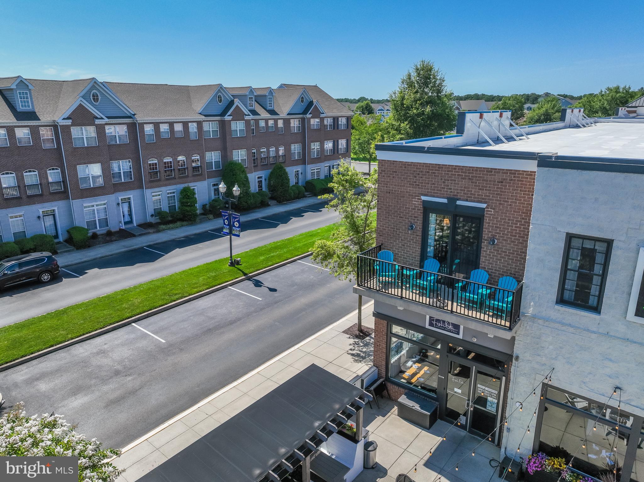 17300 North Village Main Boulevard, Unit 66 Lewes, DE 19958 - Photo 24 of 38 a house view with a garden space