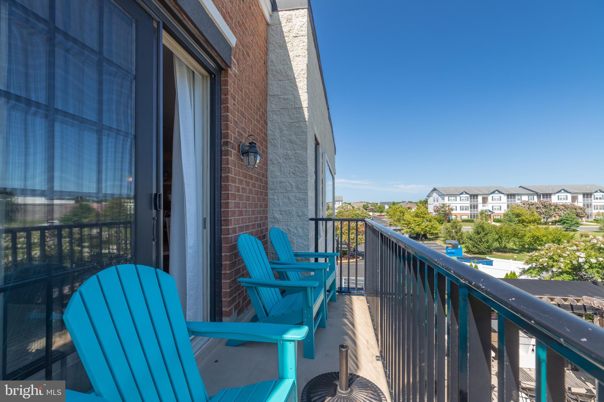 17300 North Village Main Boulevard, Unit 66 Lewes, DE 19958 - Photo 25 of 38 a view of balcony with furniture
