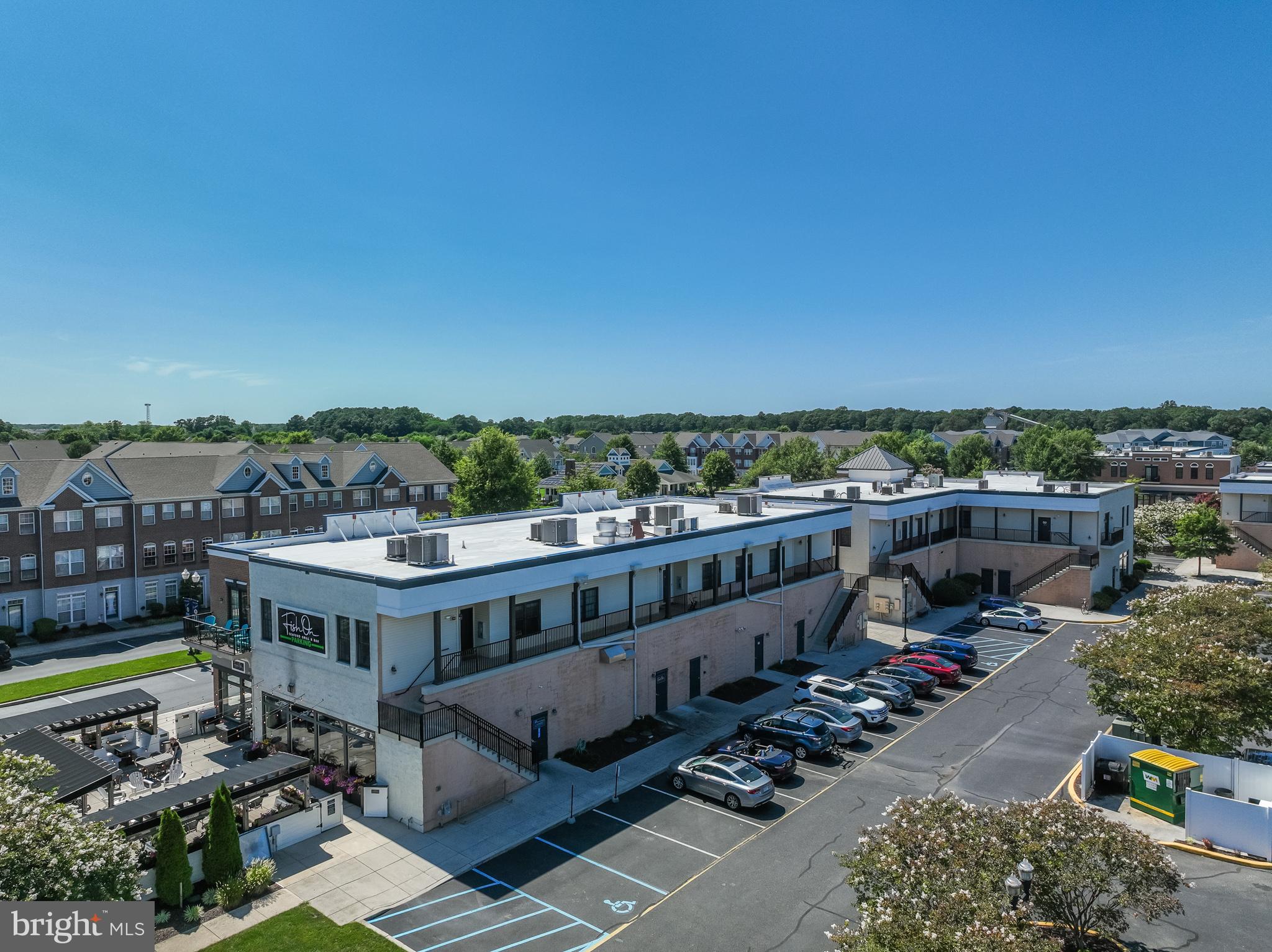 17300 North Village Main Boulevard, Unit 66 Lewes, DE 19958 - Photo 29 of 38 a view of a city from a terrace