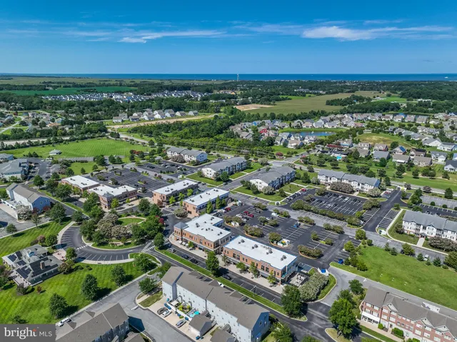 an aerial view of a city with lots of residential buildings