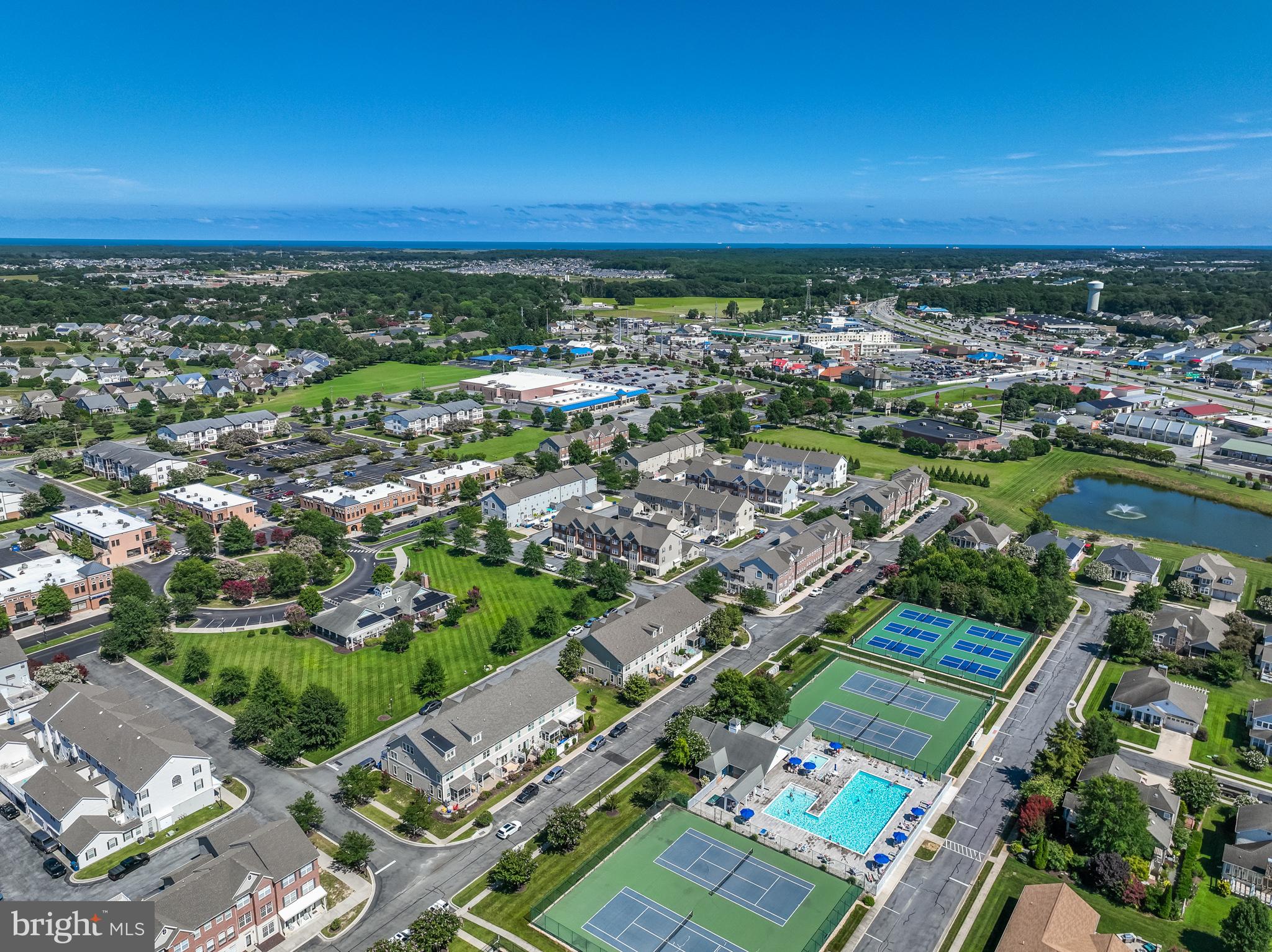 17300 North Village Main Boulevard, Unit 66 Lewes, DE 19958 - Photo 36 of 38 an aerial view of a city with lots of residential buildings