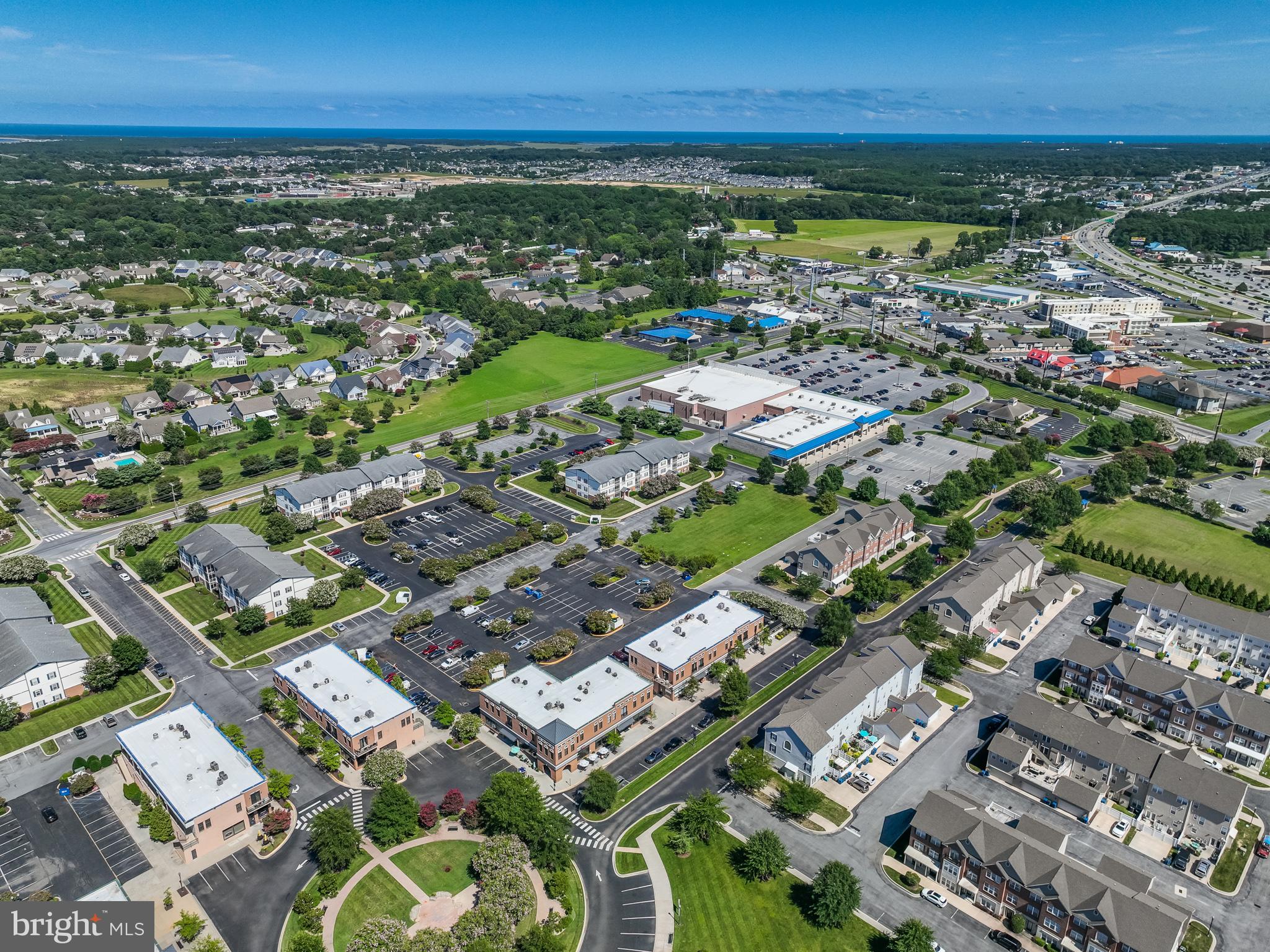 17300 North Village Main Boulevard, Unit 66 Lewes, DE 19958 - Photo 37 of 38 an aerial view of residential houses with outdoor space