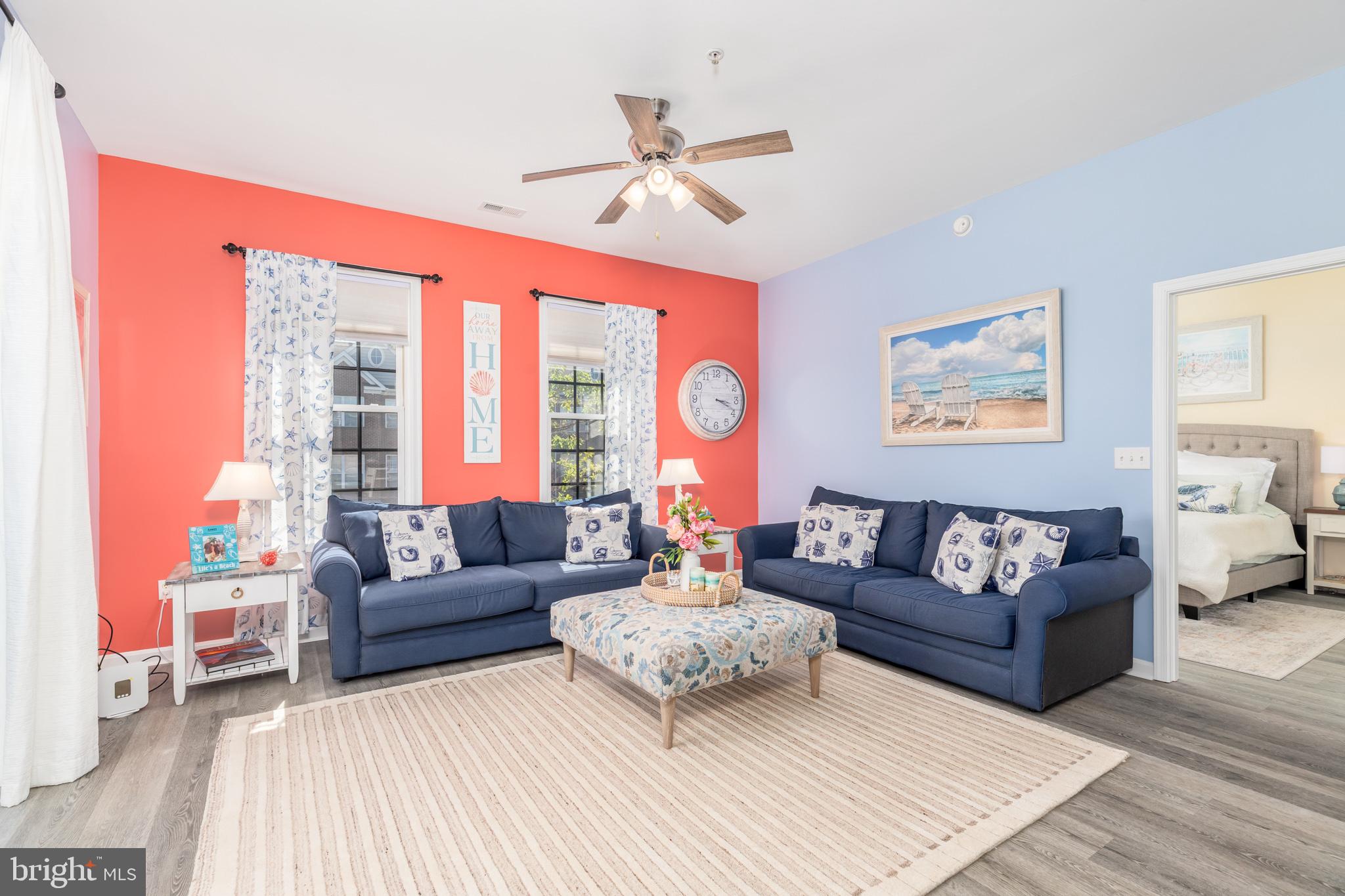 17300 North Village Main Boulevard, Unit 66 Lewes, DE 19958 - Photo 10 of 38 a living room with furniture and a large window