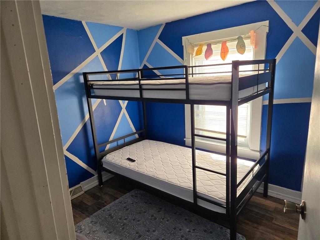 514 Penn High Park Road Jeannette, PA 15644 - Photo 14 of 30 a view of staircase with a rug and a window