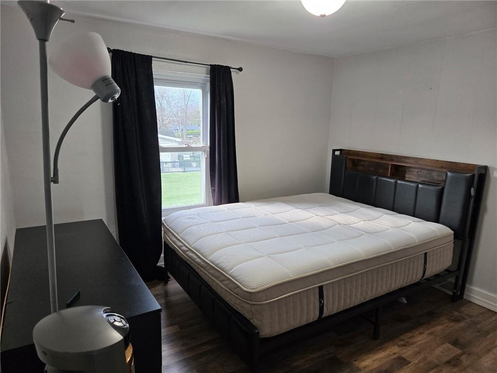 514 Penn High Park Road Jeannette, PA 15644 - Photo 20 of 30 a bedroom with a bed and a large mirror