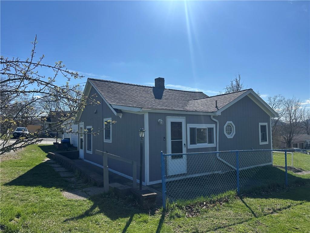 514 Penn High Park Road Jeannette, PA 15644 - Photo 2 of 30 a front view of a house with a yard