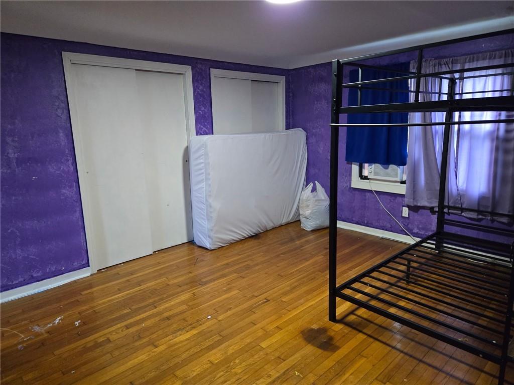 514 Penn High Park Road Jeannette, PA 15644 - Photo 23 of 30 a view of a room with wooden floor and windows