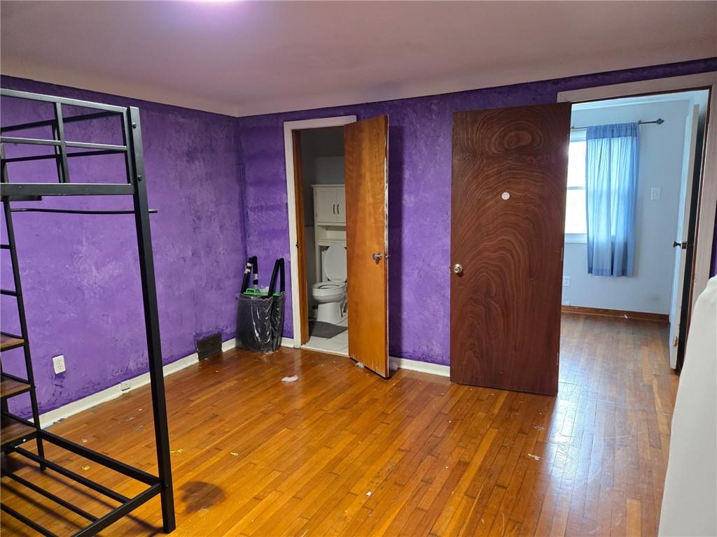514 Penn High Park Road Jeannette, PA 15644 - Photo 24 of 30 a view of a room with wooden floor and entryway