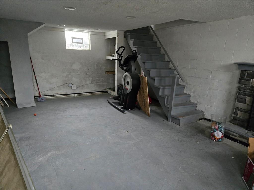 514 Penn High Park Road Jeannette, PA 15644 - Photo 29 of 30 a view of empty room with stairs and mirrors