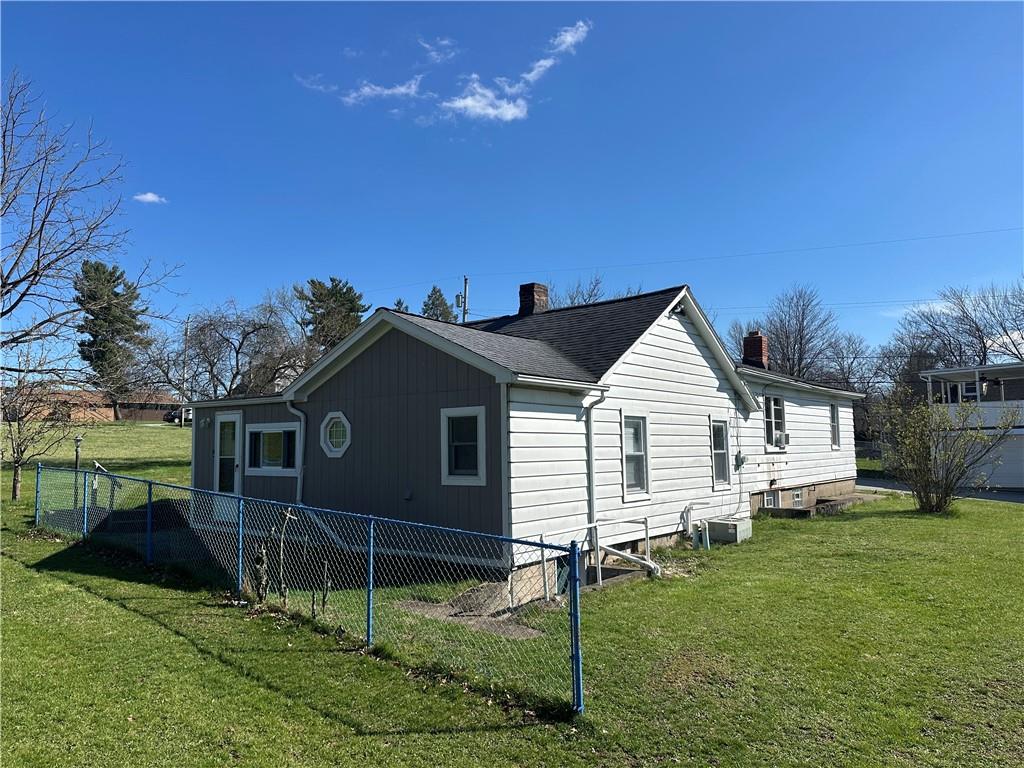 514 Penn High Park Road Jeannette, PA 15644 - Photo 4 of 30 a front view of a house with a yard