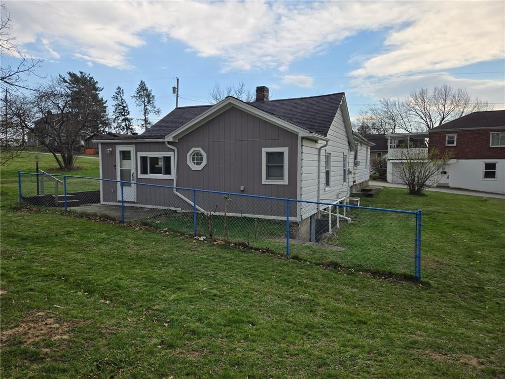 514 Penn High Park Road Jeannette, PA 15644 - Photo 5 of 30 a house view with a garden space