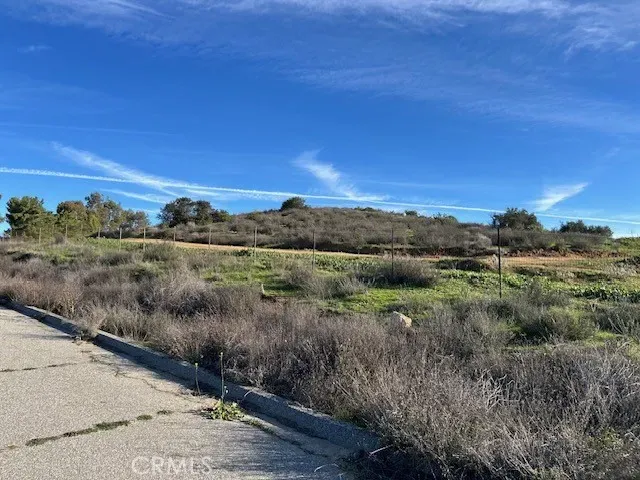 a view of a city and mountains in the background