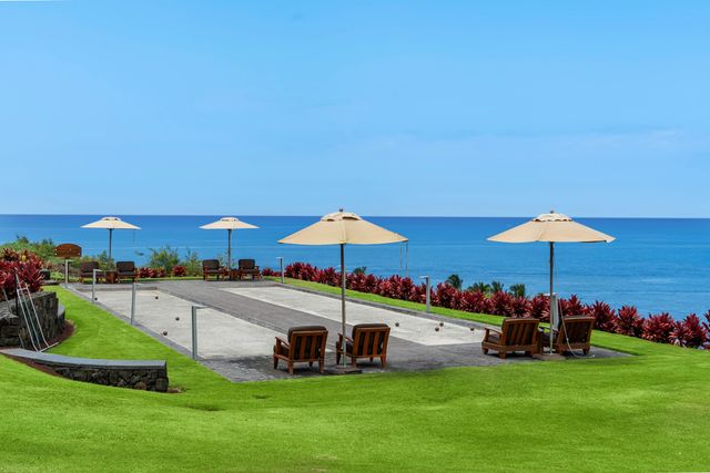 a view of a terrace with furniture