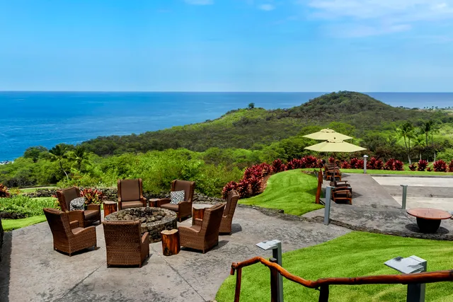 a view of a chairs and table on the terrace