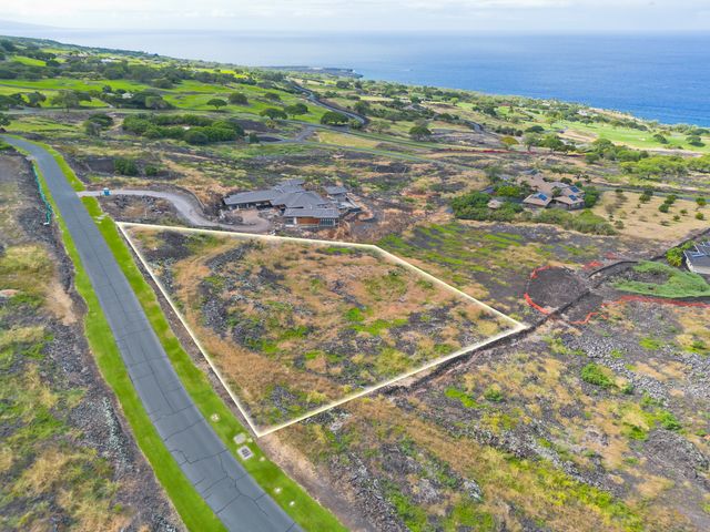 a view of an ocean and a mountain