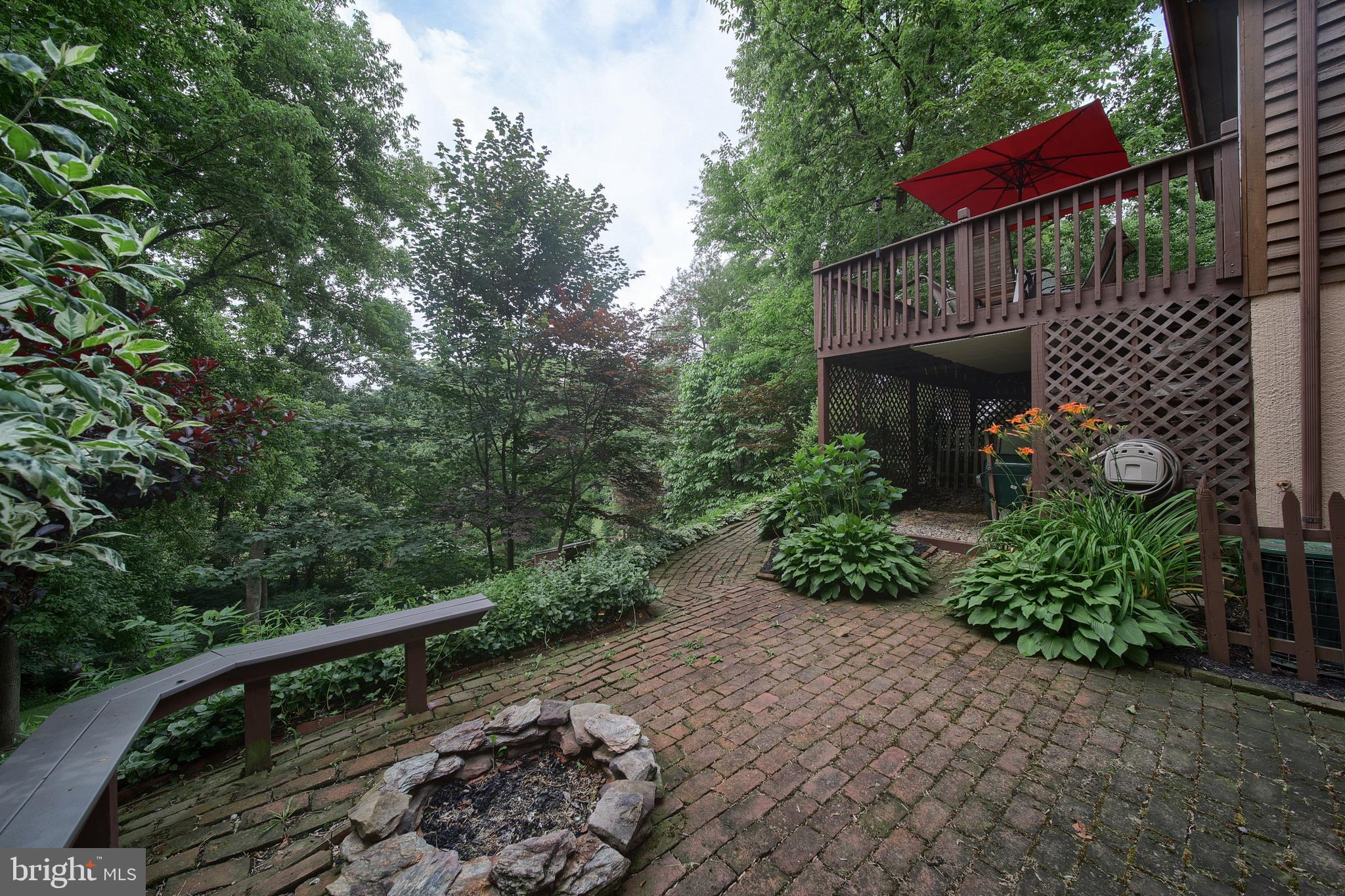 220 Stone Hill Road Conestoga, PA 17516 - Photo 22 of 26 Rear patio and firepit off of Family Room