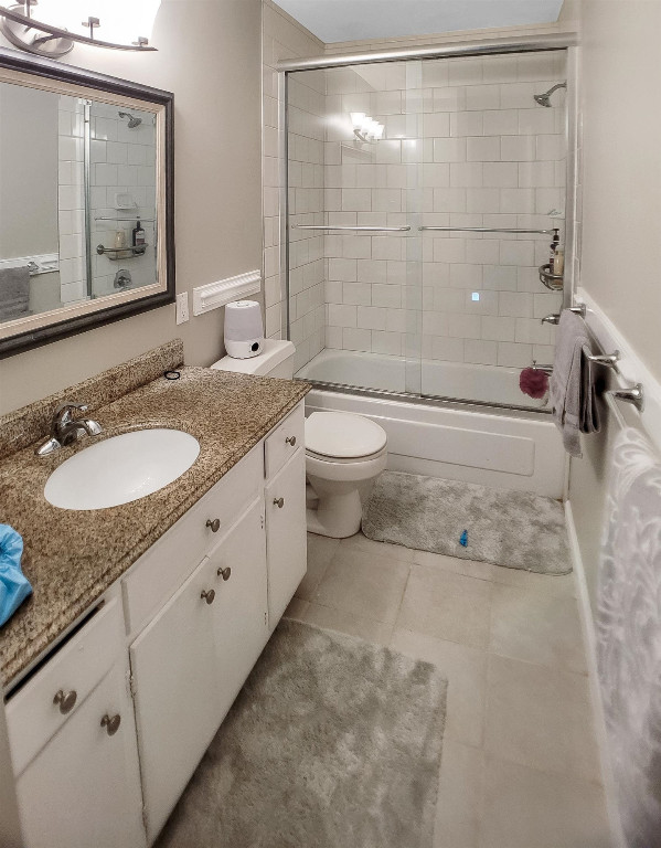 Undisclosed Address Raleigh, NC 27604 - Photo 17 of 32 a bathroom with a granite countertop sink toilet and shower