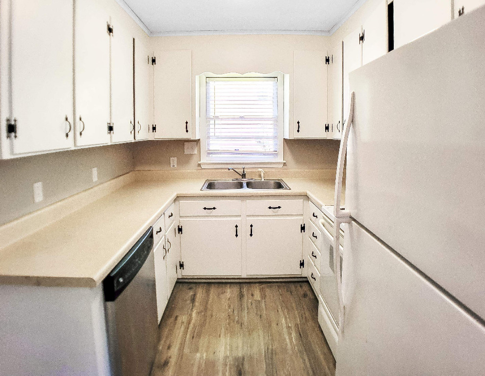 Undisclosed Address Raleigh, NC 27604 - Photo 22 of 32 a utility room with cabinets washer and dryer