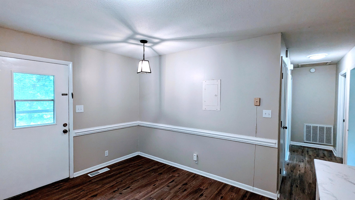 Undisclosed Address Raleigh, NC 27604 - Photo 5 of 32 wooden floor in an empty room