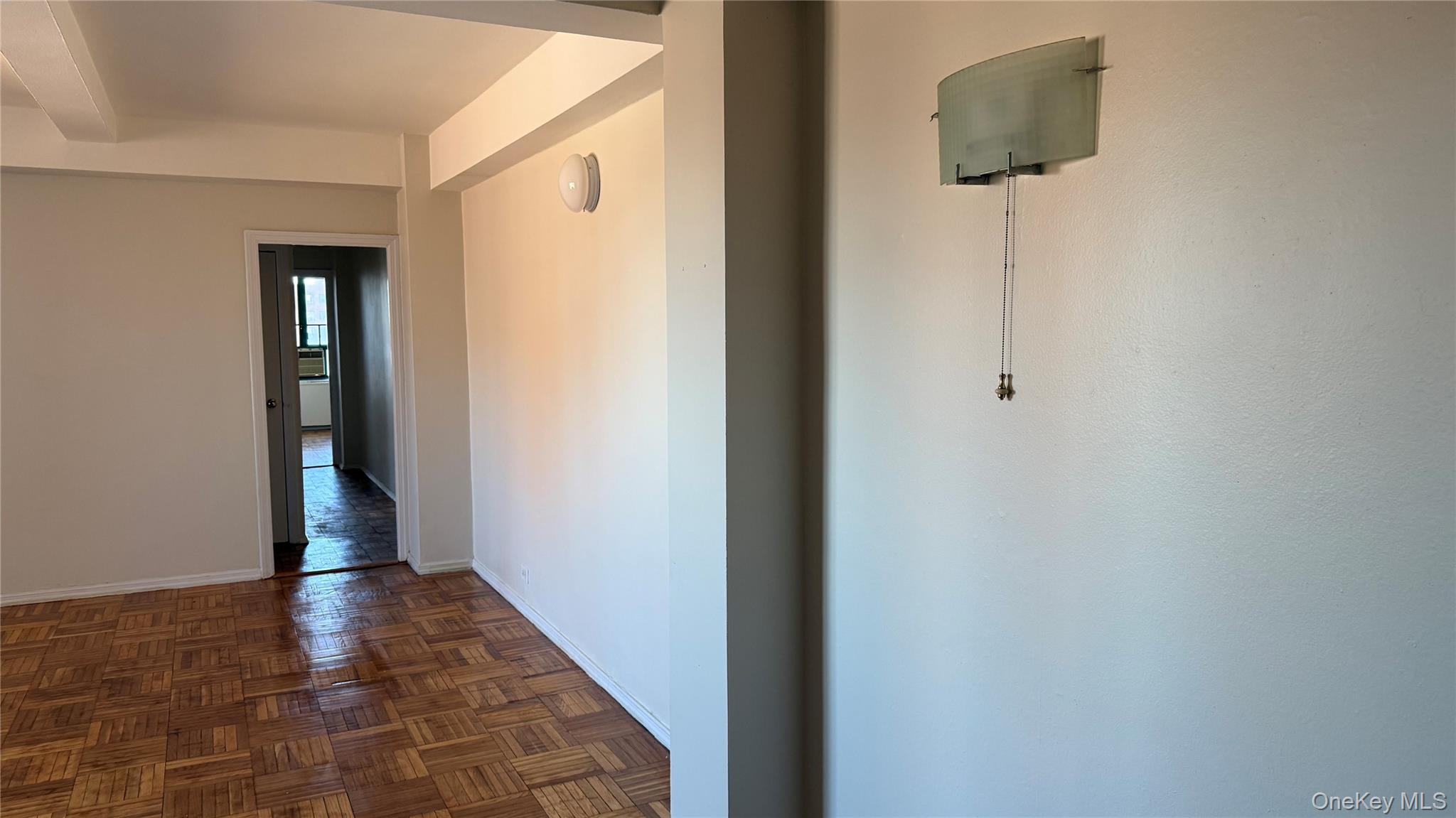 20 Metropolitan Ovl, Unit 11A Bronx, NY 10462 - Photo 16 of 16 Hall with baseboards