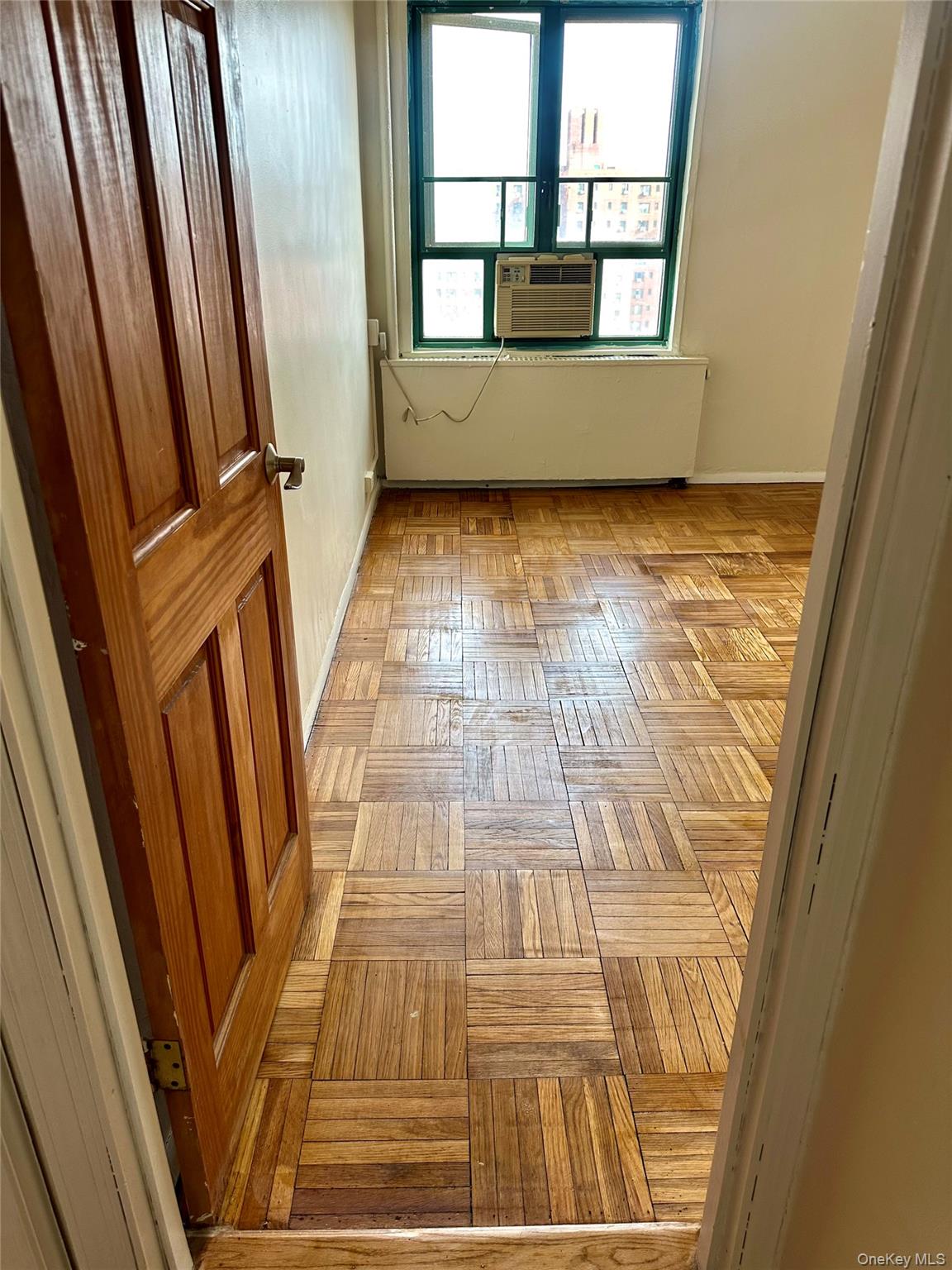 20 Metropolitan Ovl, Unit 11A Bronx, NY 10462 - Photo 9 of 16 Spare room featuring baseboards