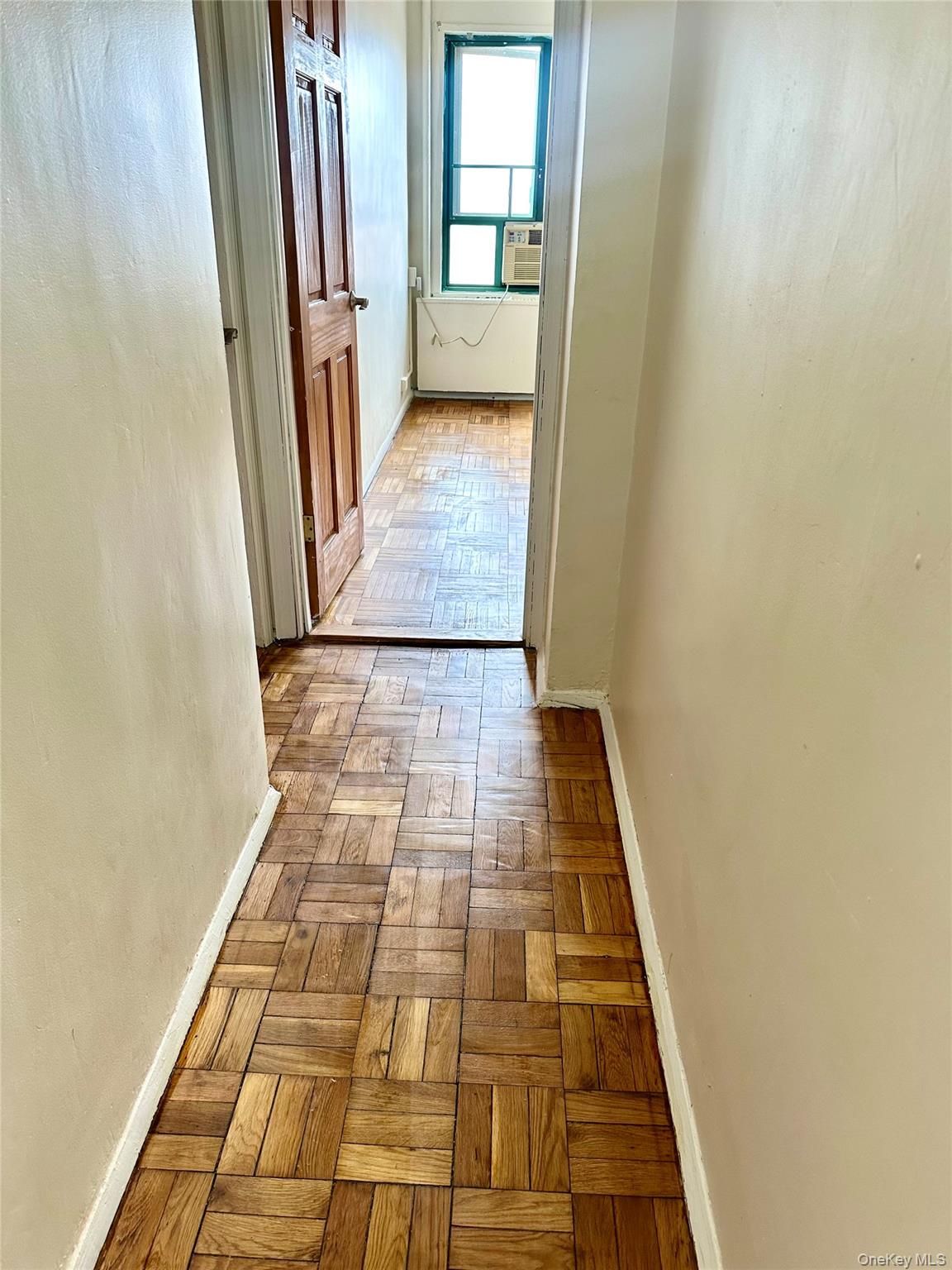 20 Metropolitan Ovl, Unit 11A Bronx, NY 10462 - Photo 10 of 16 Corridor featuring baseboards